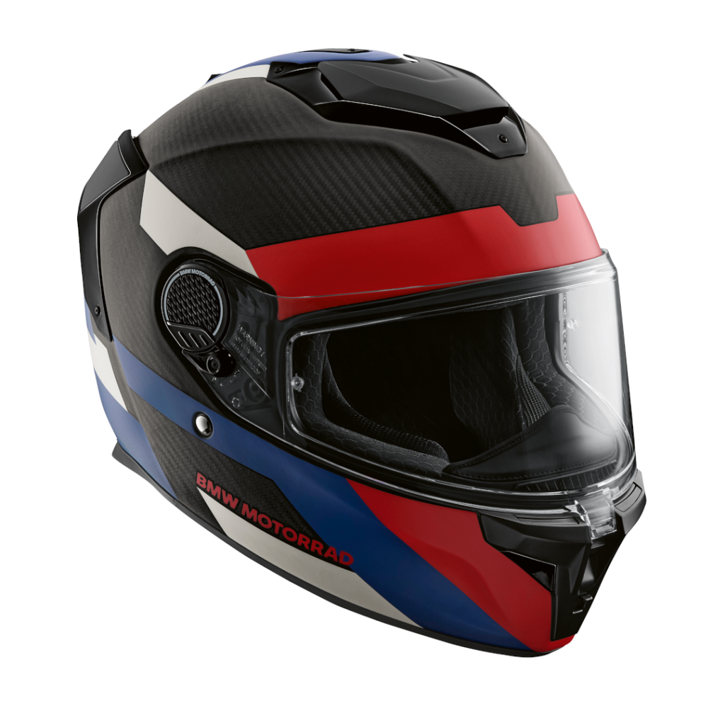 Ein Vollvisierhelm von BMW Motorrad mit schwarzem, rotem, blauem und weißem Design, klarem Visier und aerodynamischen Belüftungsöffnungen - ein echtes Highlight der Monate für Fahrer, die auffallenden Stil und Sicherheit suchen. Rider's Point der Kaltenbach Gruppe. Dein Partner für BMW Motorrad und Honda.