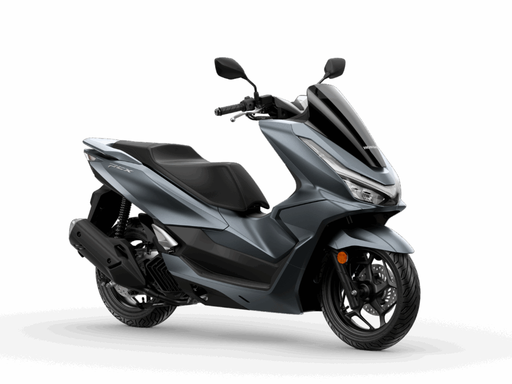 Ein schlanker, moderner grauer Roller mit schwarzen Akzenten, abgewinkelten Spiegeln und einem stromlinienförmigen Design wird auf einem weißen Hintergrund gezeigt - perfekt für die HONDA 125er Deal Days. Der Roller verfügt über einen bequemen Sitz und auffällige Frontscheinwerfer. Rider's Point der Kaltenbach Gruppe. Dein Partner für BMW Motorrad und Honda.
